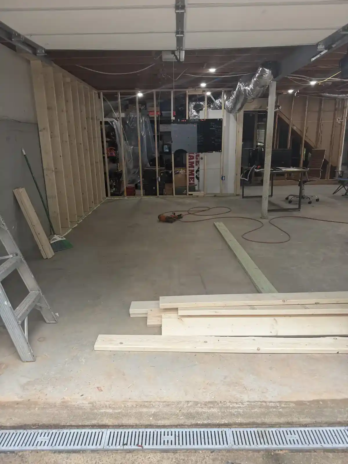 Garage before surface coating, concrete exposed during prep